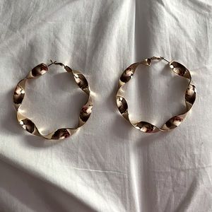 Gold squiggly hoops
